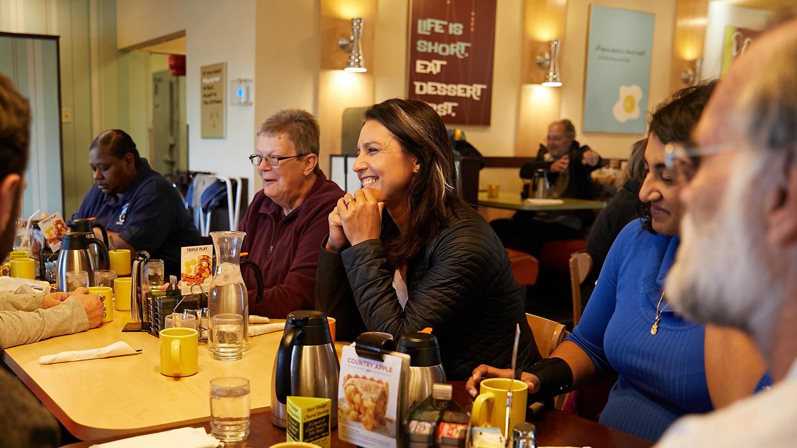 Tulsi with volunteers