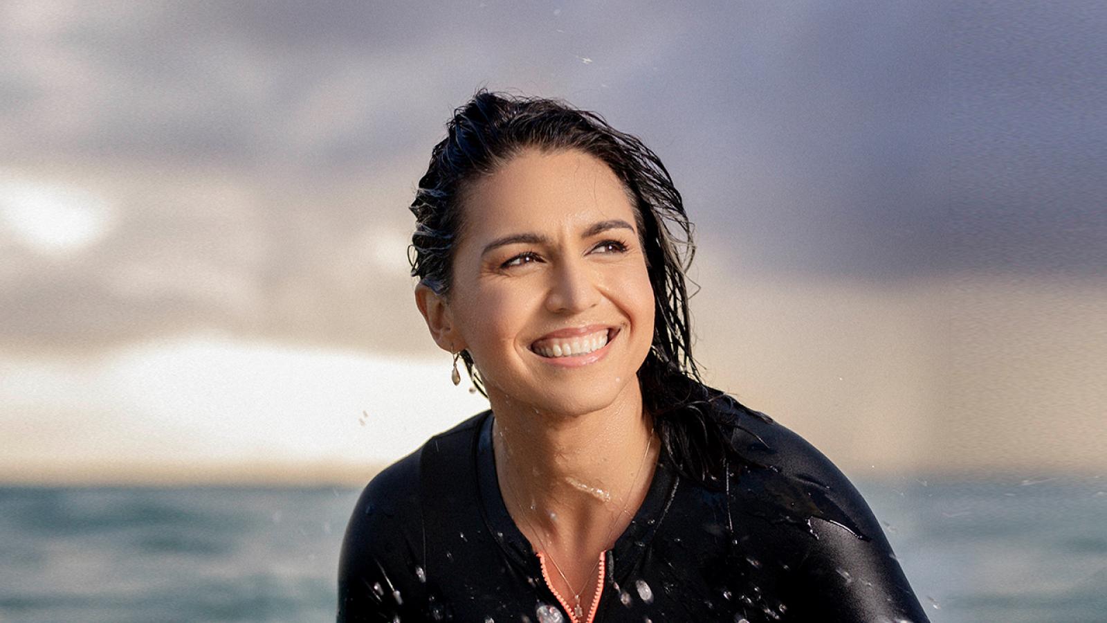 Tulsi Gabbard in the surf